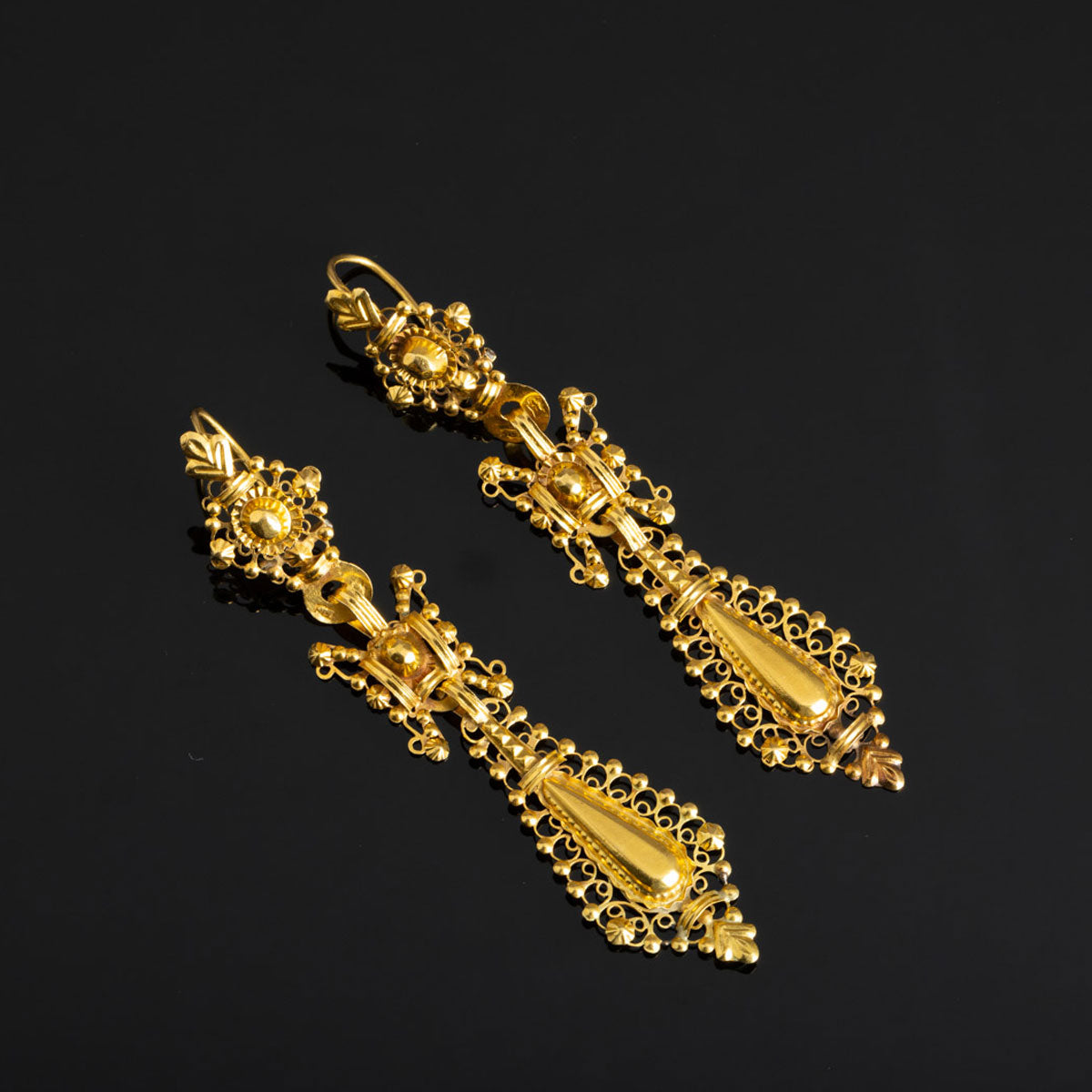 Exploring the timeless elegance of neoclassical earrings: A journey through history